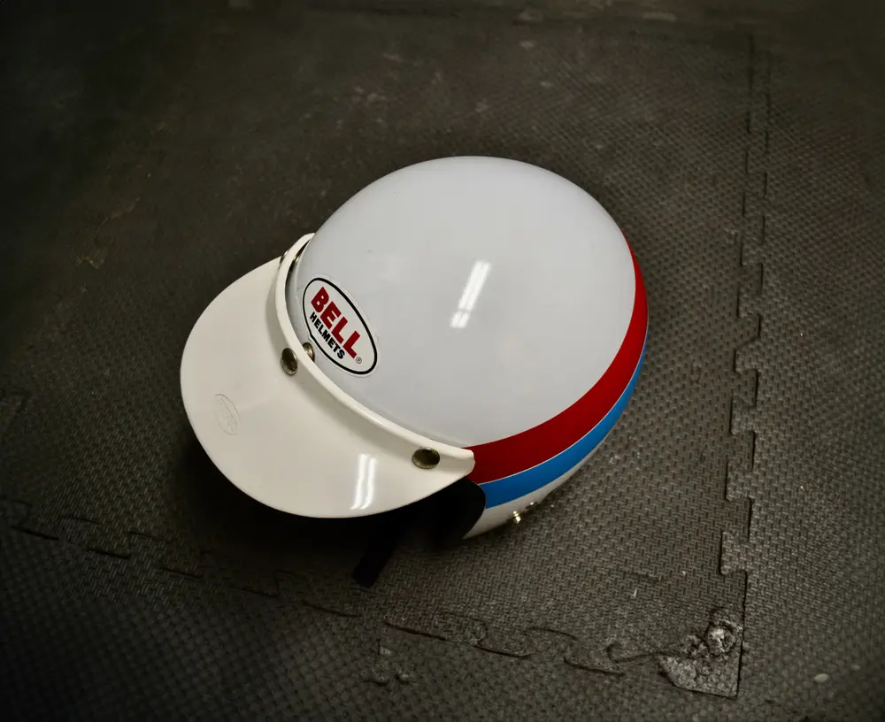 1960's Peter Gregg Brumos Porsche Racing Helmet by Bell — Sold