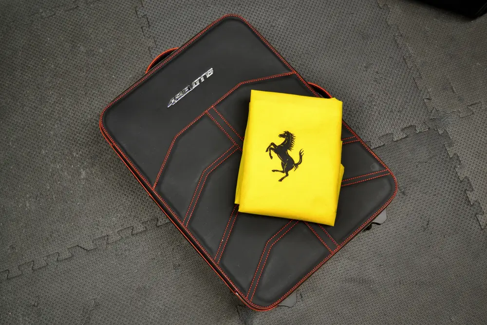 Collection of Ferrari Luggage, Literature, and Accessories