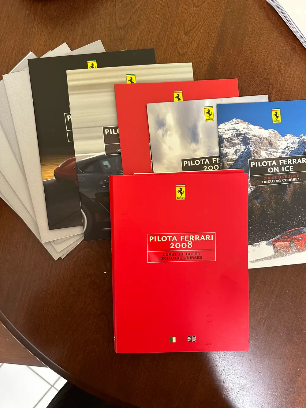 No Reserve Ferrari VIP Passports, brochures, and classic color samples