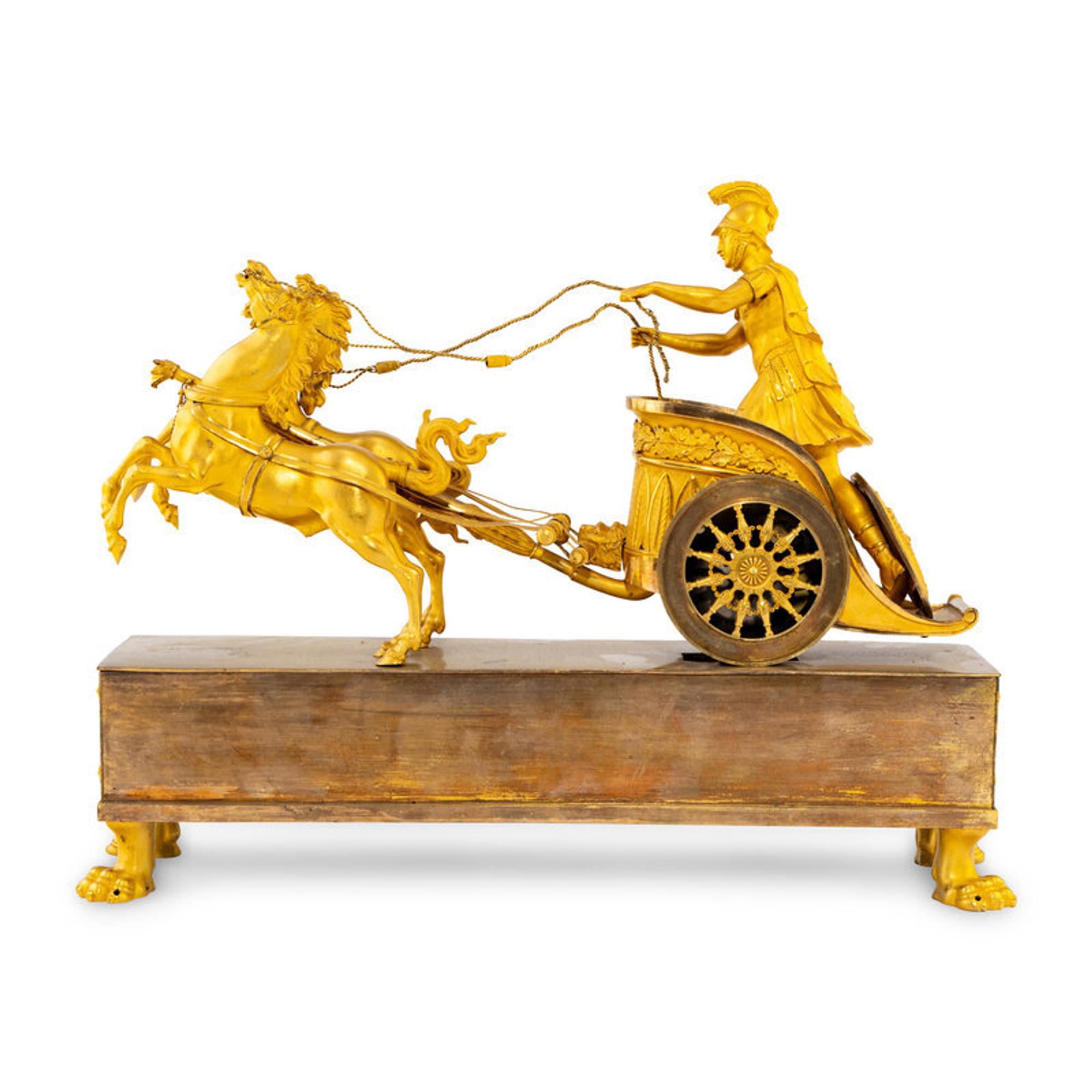 An Empire Gilt Bronze Figural Mantel Clock