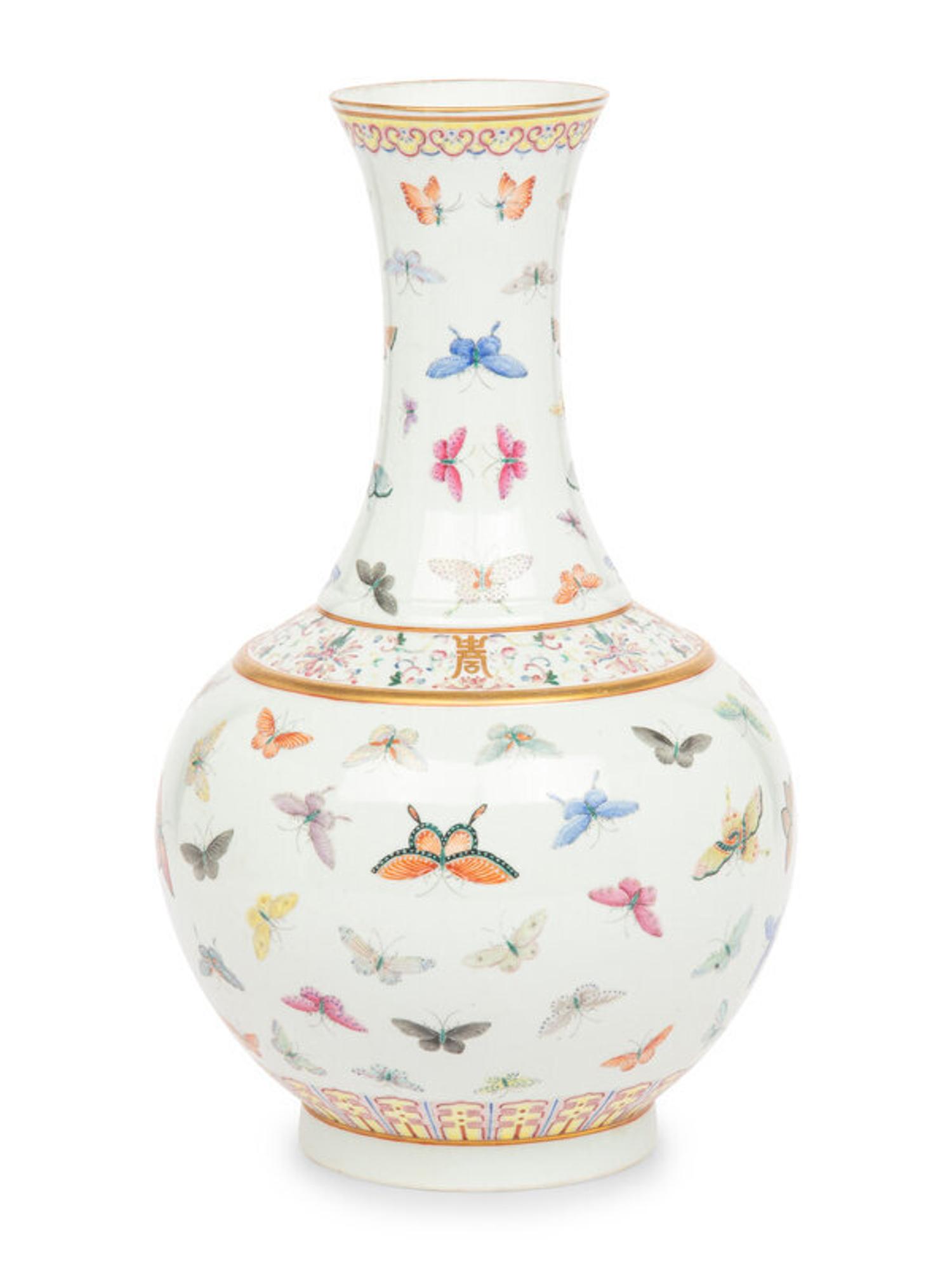 A Chinese Famille Rose 'Butterflies' Bottle Vase, Guangxu Six-Character Mark 光緒款 粉彩百蝶圖賞瓶