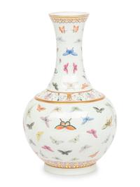 A Chinese Famille Rose 'Butterflies' Bottle Vase, Guangxu Six-Character Mark 光緒款 粉彩百蝶圖賞瓶