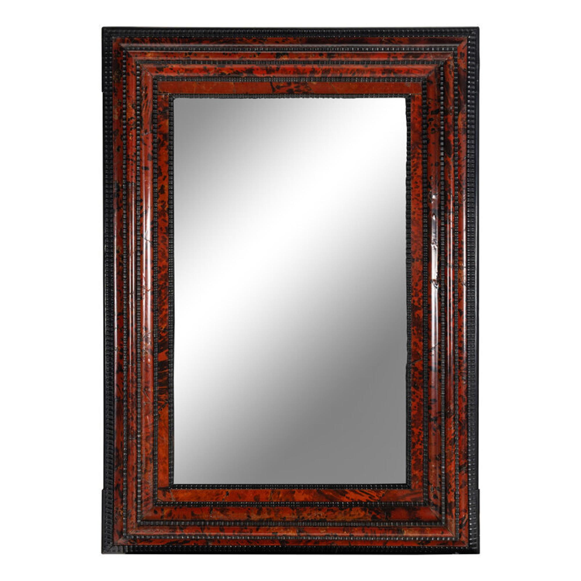 A Flemish Part-Ebonized and Tortoiseshell Veneered Ripple-Molded Mirror