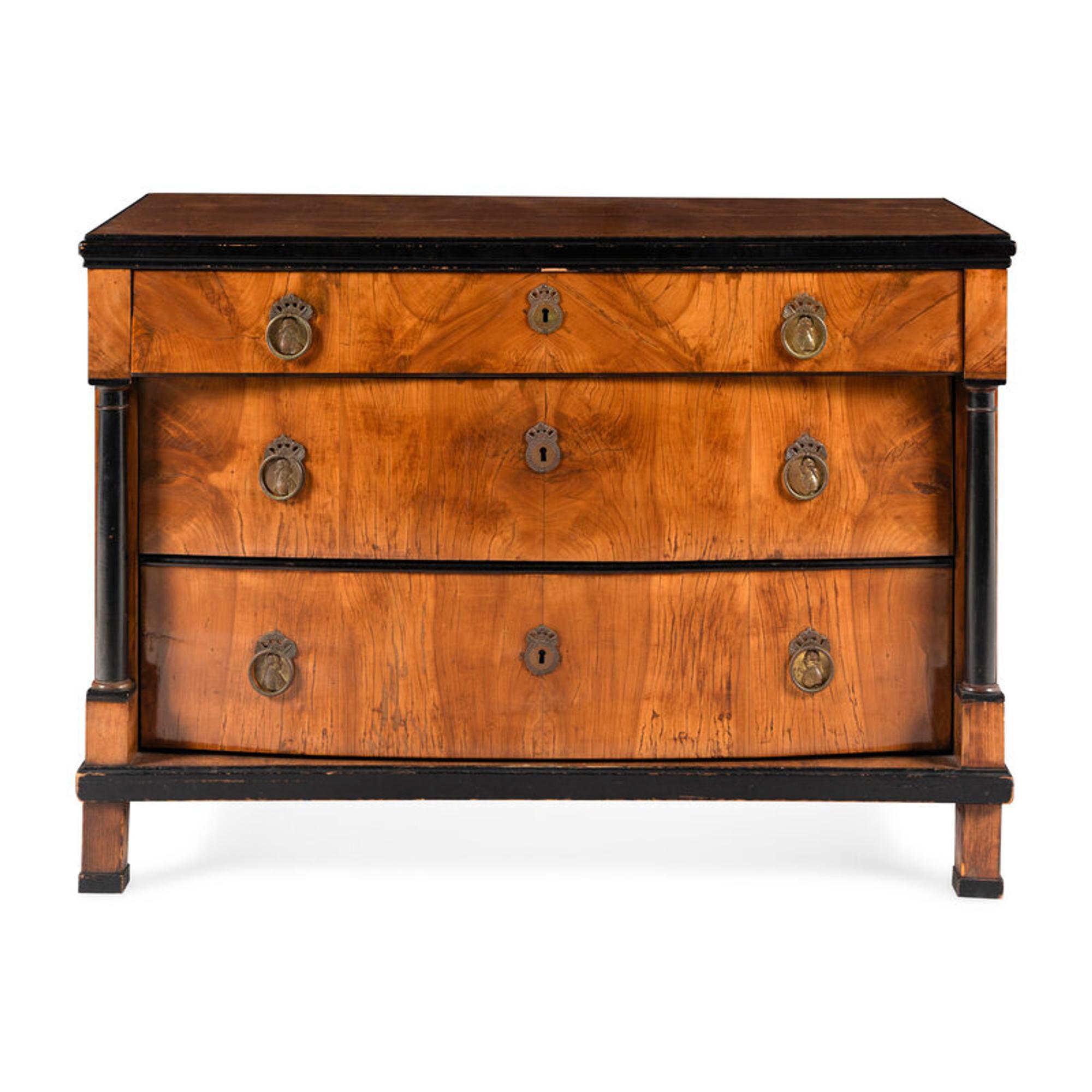 A Biedermeier Part-Ebonized Pearwood Commode