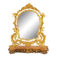 A Rococo Revival Gilt Bronze and Giltwood Dressing Mirror