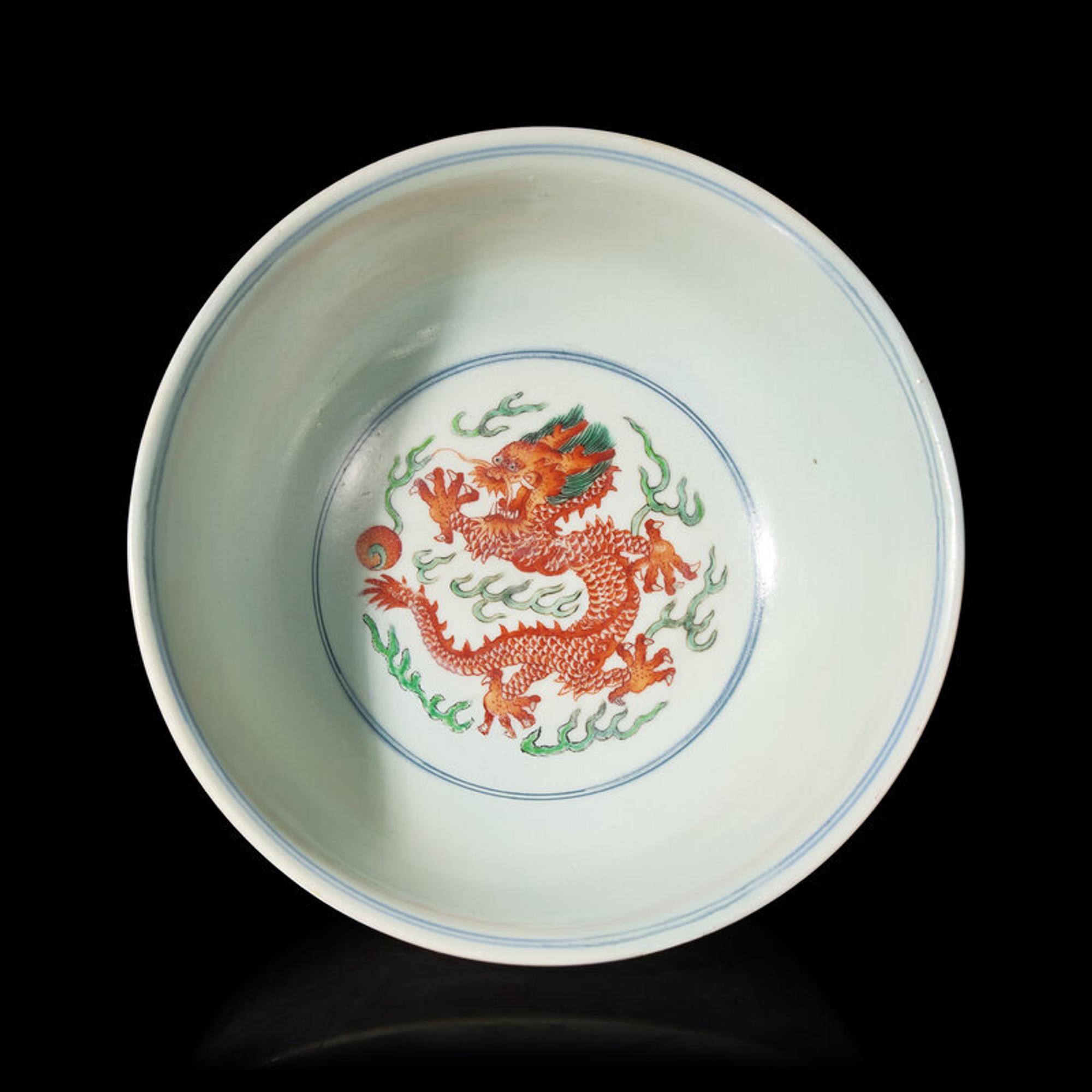 A Chinese Wucai Porcelain 'Dragon and Phoenix' Bowl, Qianlong Mark and of The Period 清乾隆 五彩龍鳳紋宮盌