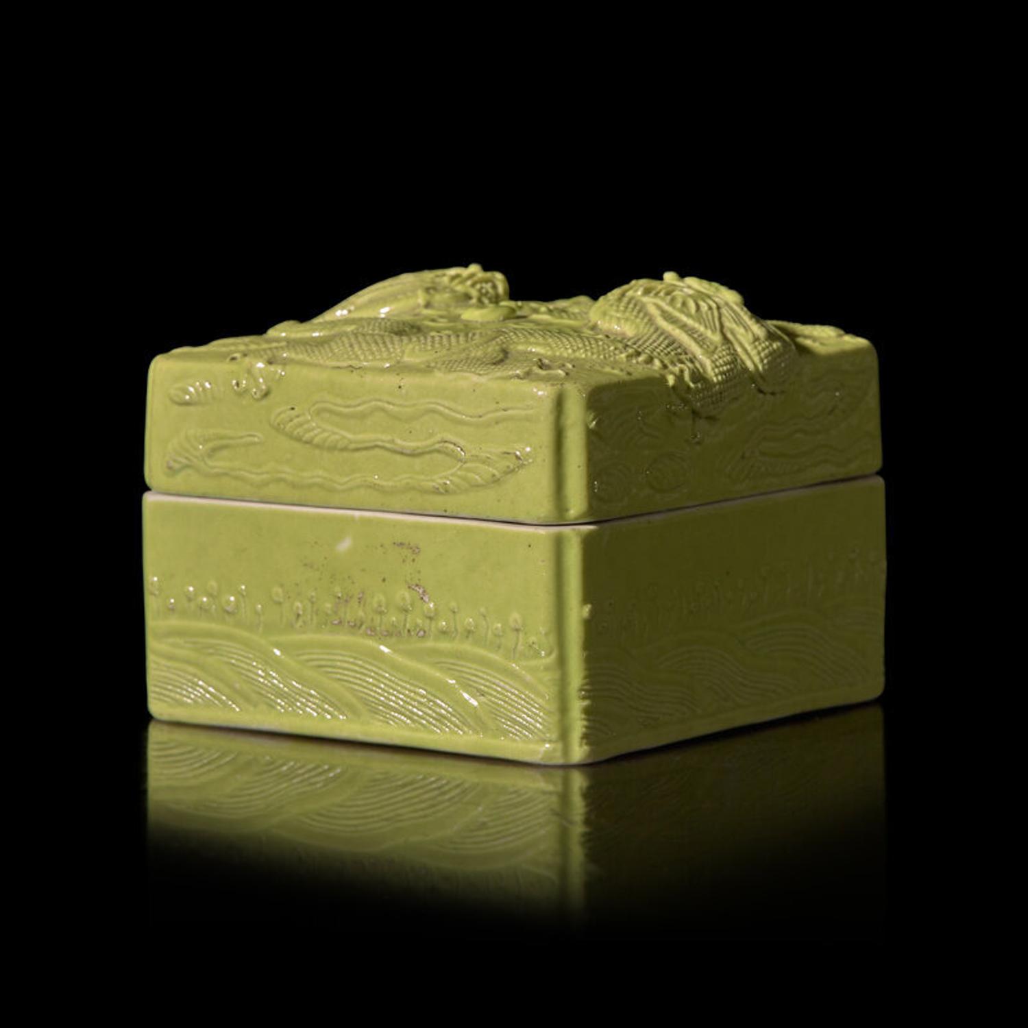 A Chinese Carved Lime-Green Glazed Porcelain 'Dragons' Square Seal Paste Box and Cover, Late Qing Dynasty, Wang Bingrong Impressed Seal Mark 清晚期 王炳榮款檸檬綠釉模印雕二龍戲珠紋方型蓋盒