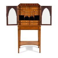 A German or Dutch Bird's Eye Maple and Rosewood Collector's Cabinet on Stand