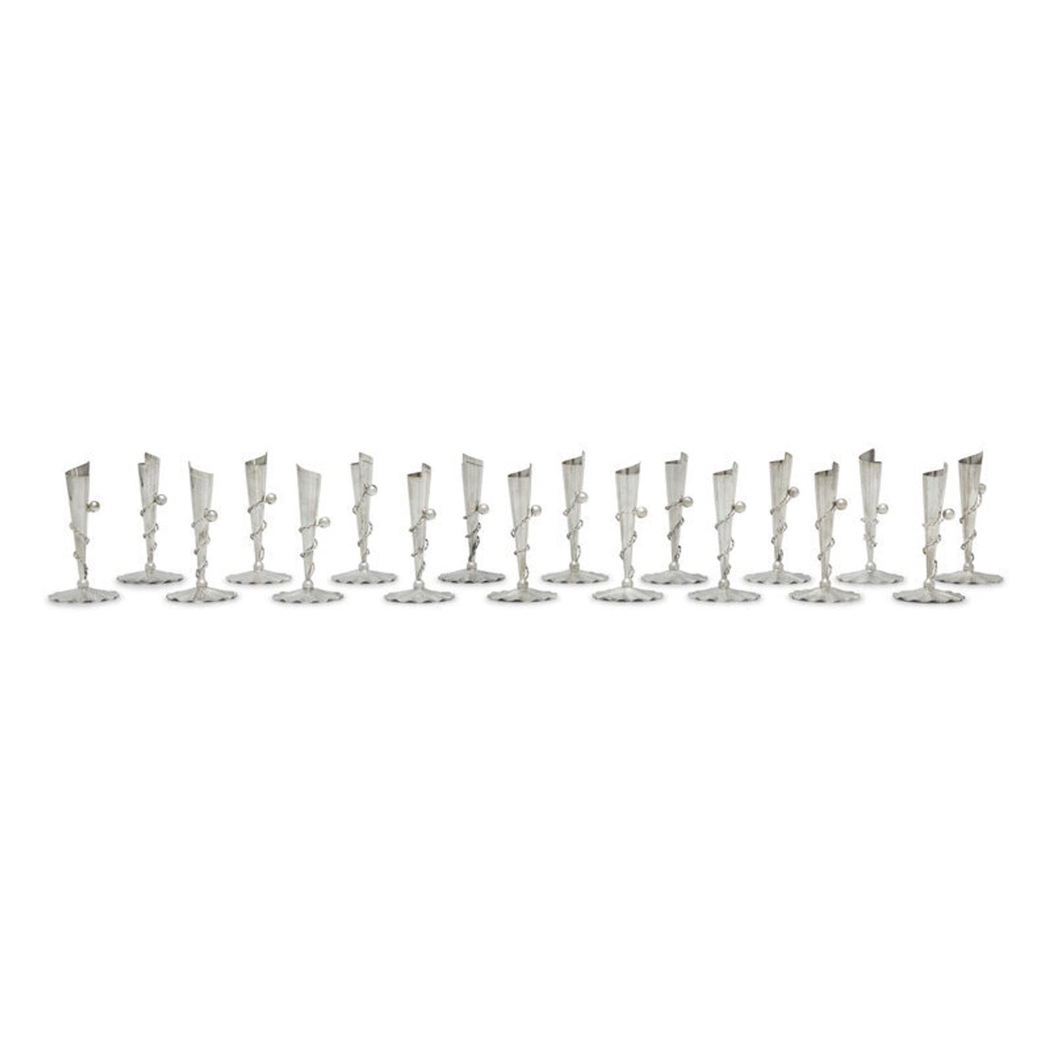 A Set of Eighteen Peruvian Silver Tapersticks