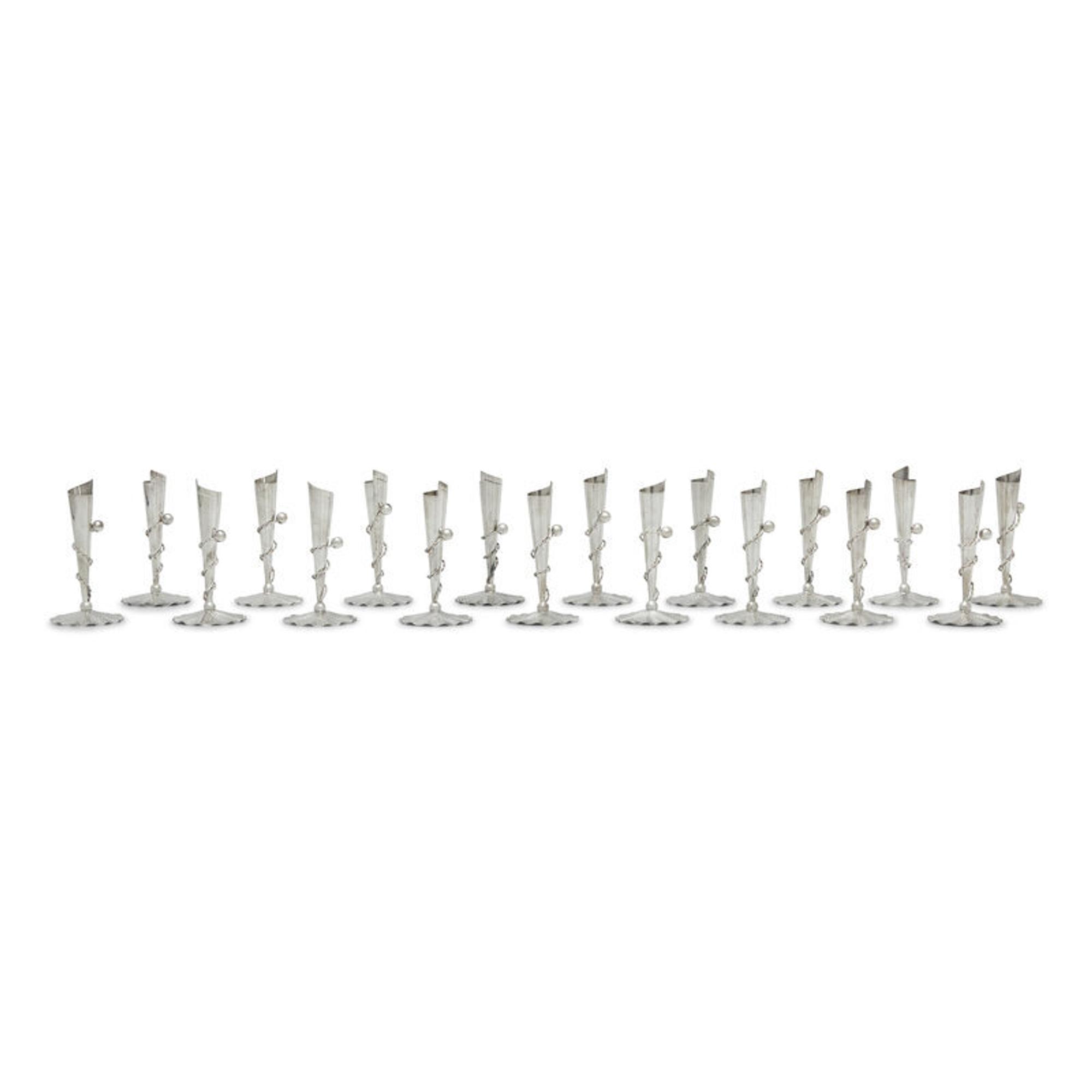 A Set of Eighteen Peruvian Silver Tapersticks