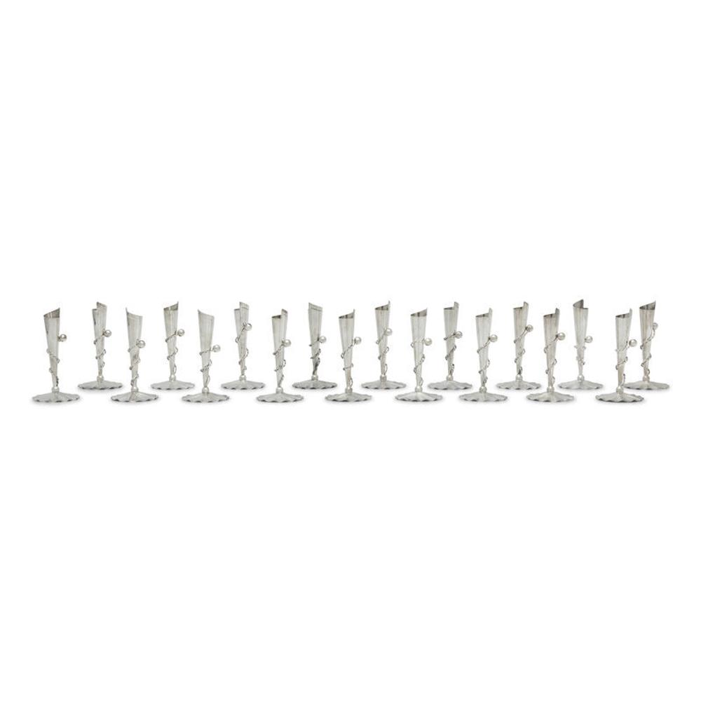 A Set of Eighteen Peruvian Silver Tapersticks