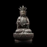 A Chinese Patinated Bronze Figure of a Seated Bodhisattva 銅觀音坐像