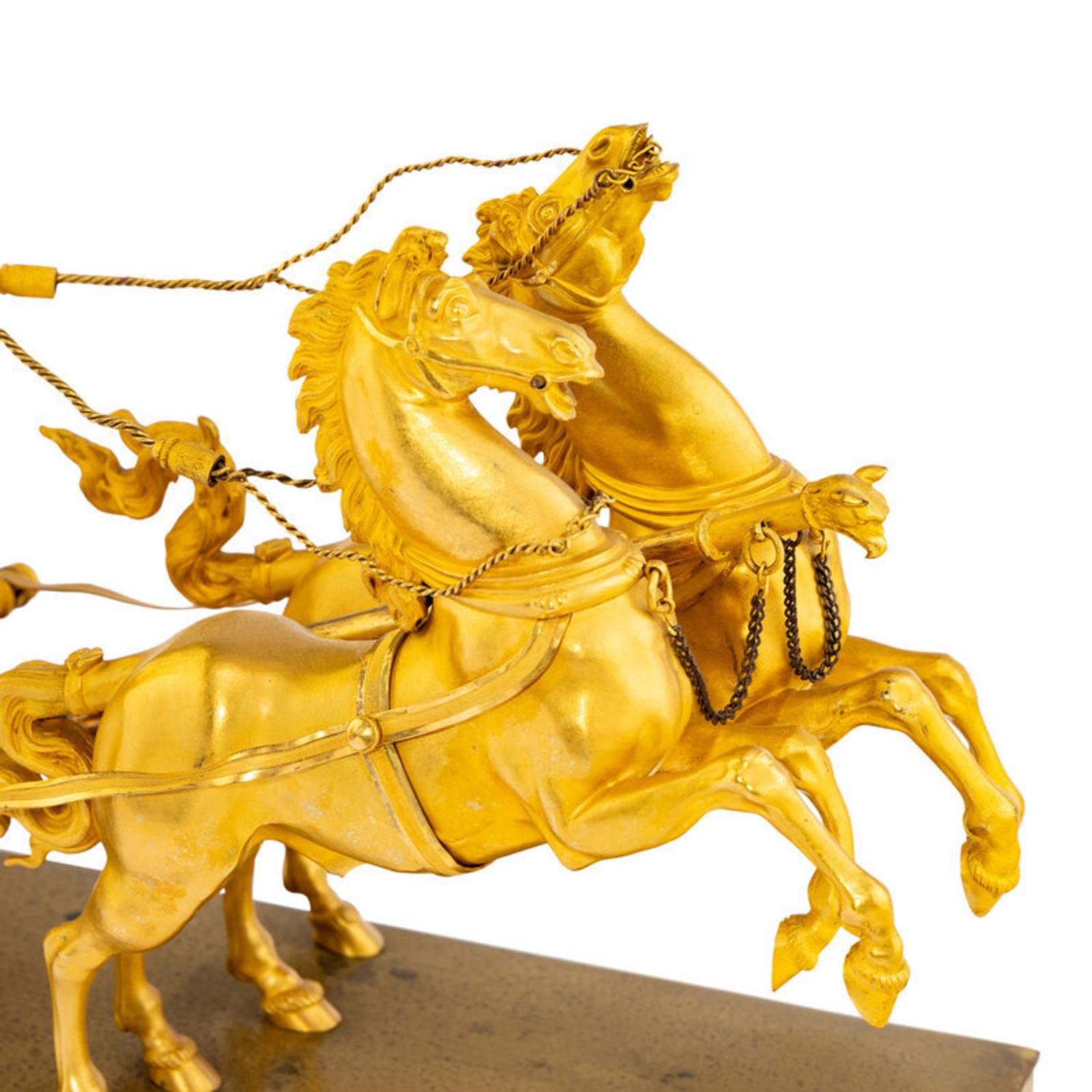 An Empire Gilt Bronze Figural Mantel Clock