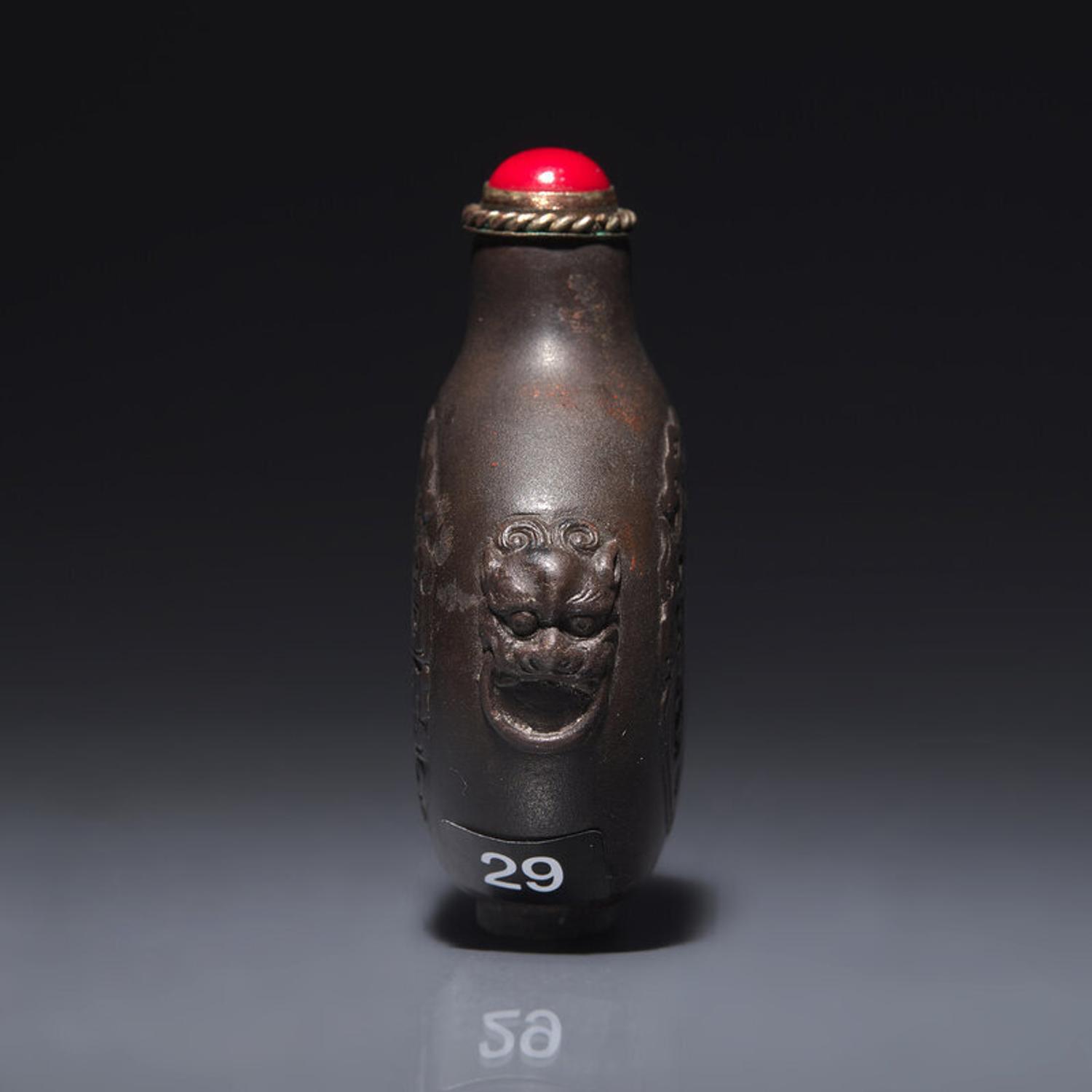 A Chinese Carved Duan Stone Snuff Bottle, Circa 1750-1820 1750-1820年 端石刻龍紋鼻烟壺