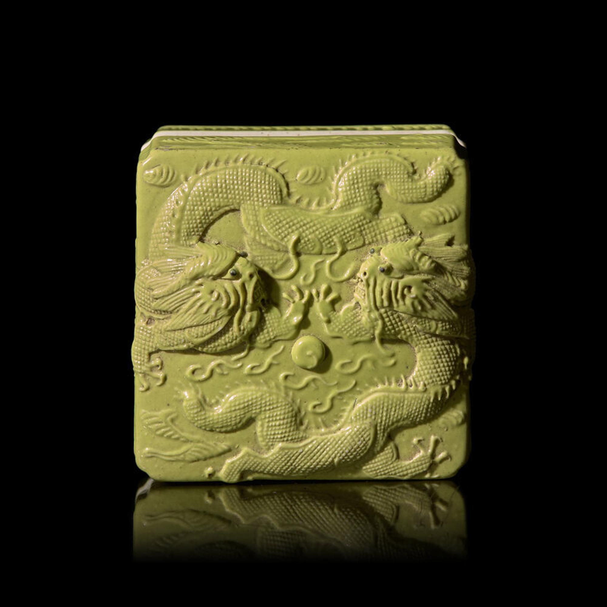 A Chinese Carved Lime-Green Glazed Porcelain 'Dragons' Square Seal Paste Box and Cover, Late Qing Dynasty, Wang Bingrong Impressed Seal Mark 清晚期 王炳榮款檸檬綠釉模印雕二龍戲珠紋方型蓋盒