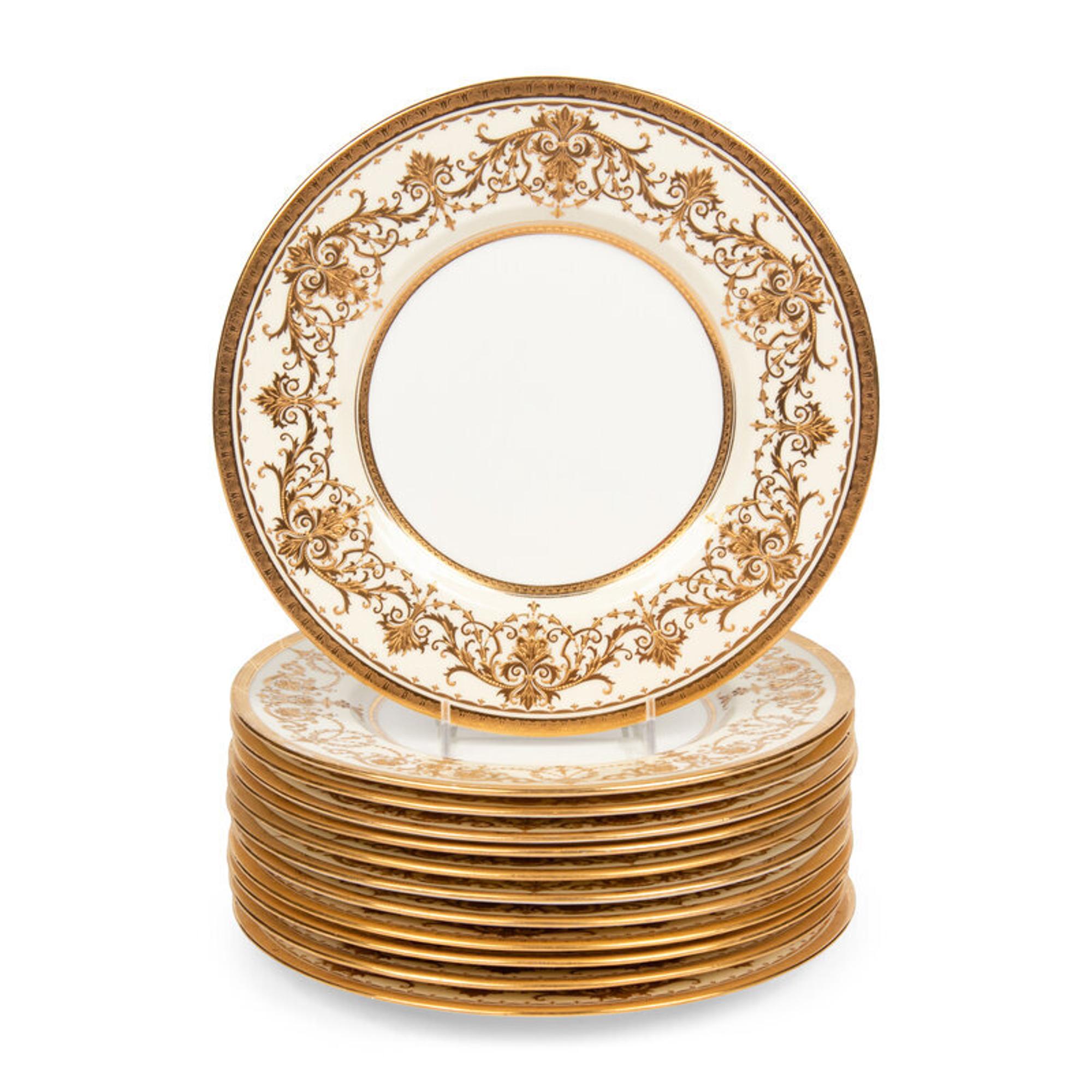 A Set of Twelve Minton Parcel-Gilt Porcelain Plates