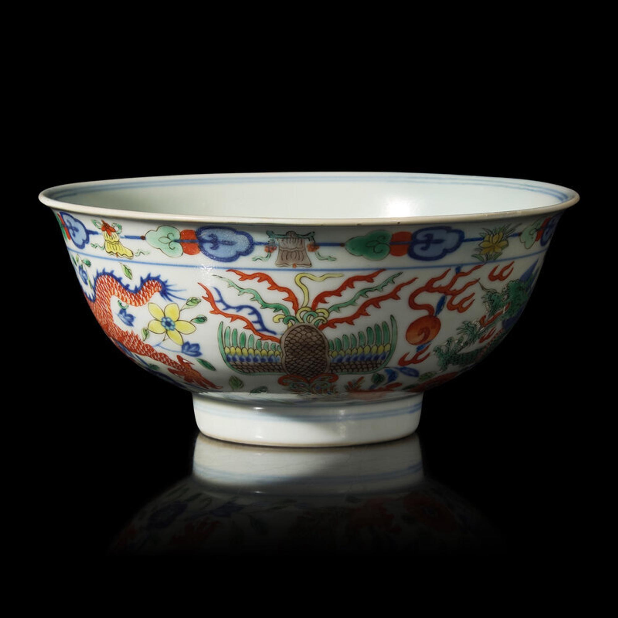 A Chinese Wucai Porcelain 'Dragon and Phoenix' Bowl, Qianlong Mark and of The Period 清乾隆 五彩龍鳳紋宮盌