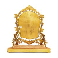 A Rococo Revival Gilt Bronze and Giltwood Dressing Mirror