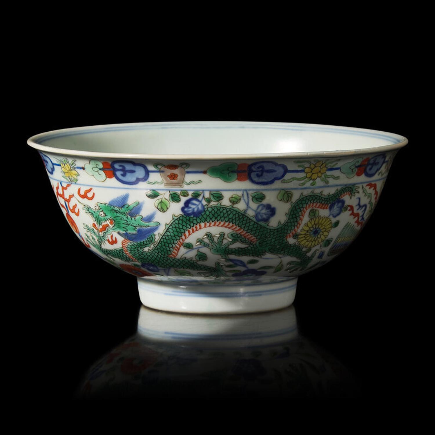 A Chinese Wucai Porcelain 'Dragon and Phoenix' Bowl, Qianlong Mark and of The Period 清乾隆 五彩龍鳳紋宮盌
