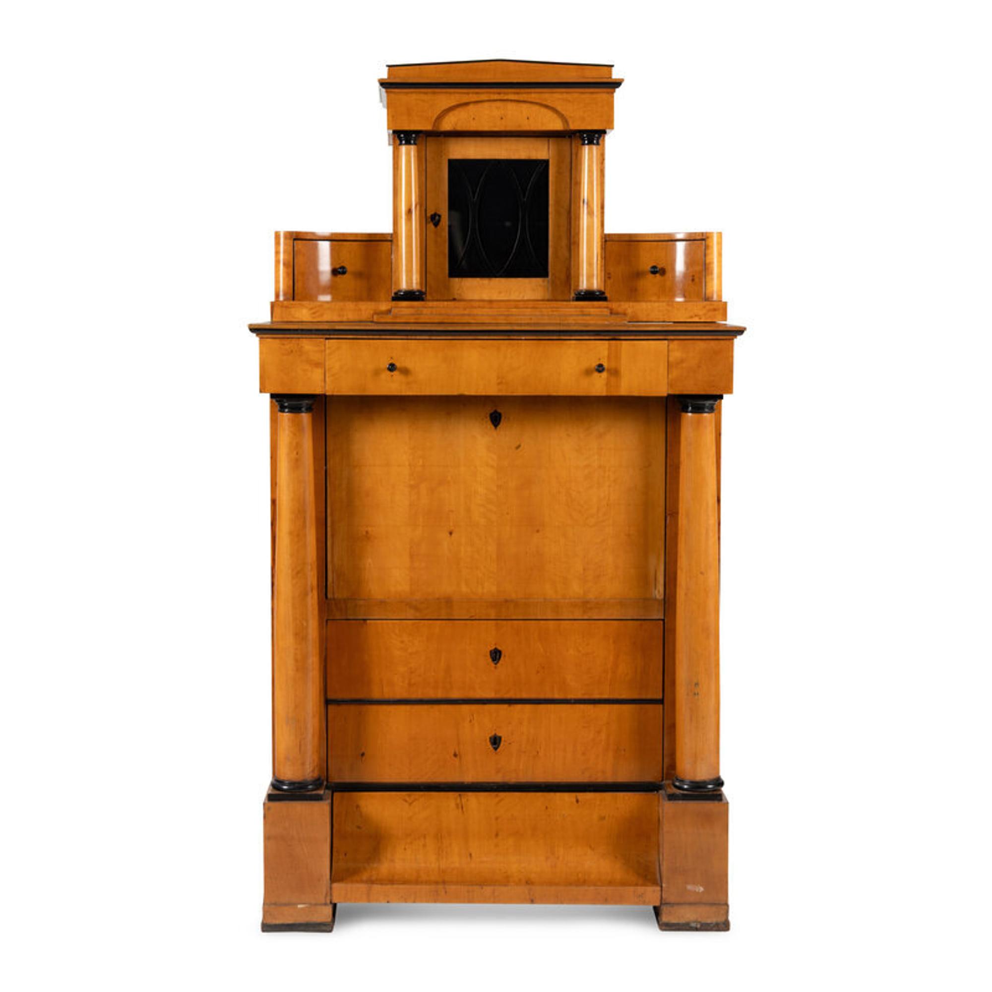 A Biedermeier Part-Ebonized Birch Bureau Cabinet