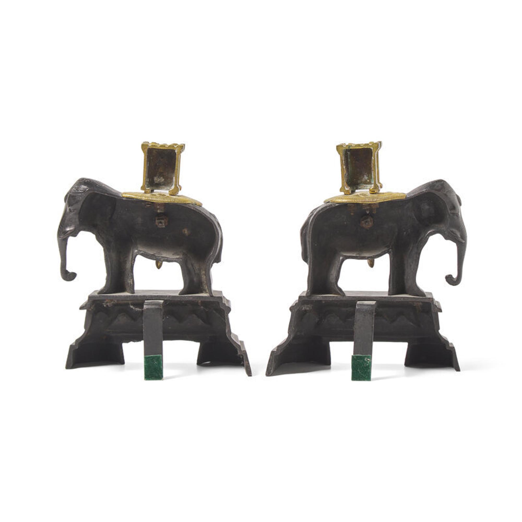 A Pair of French Patinated and Gilt Bronze Elephant-Form Chenets