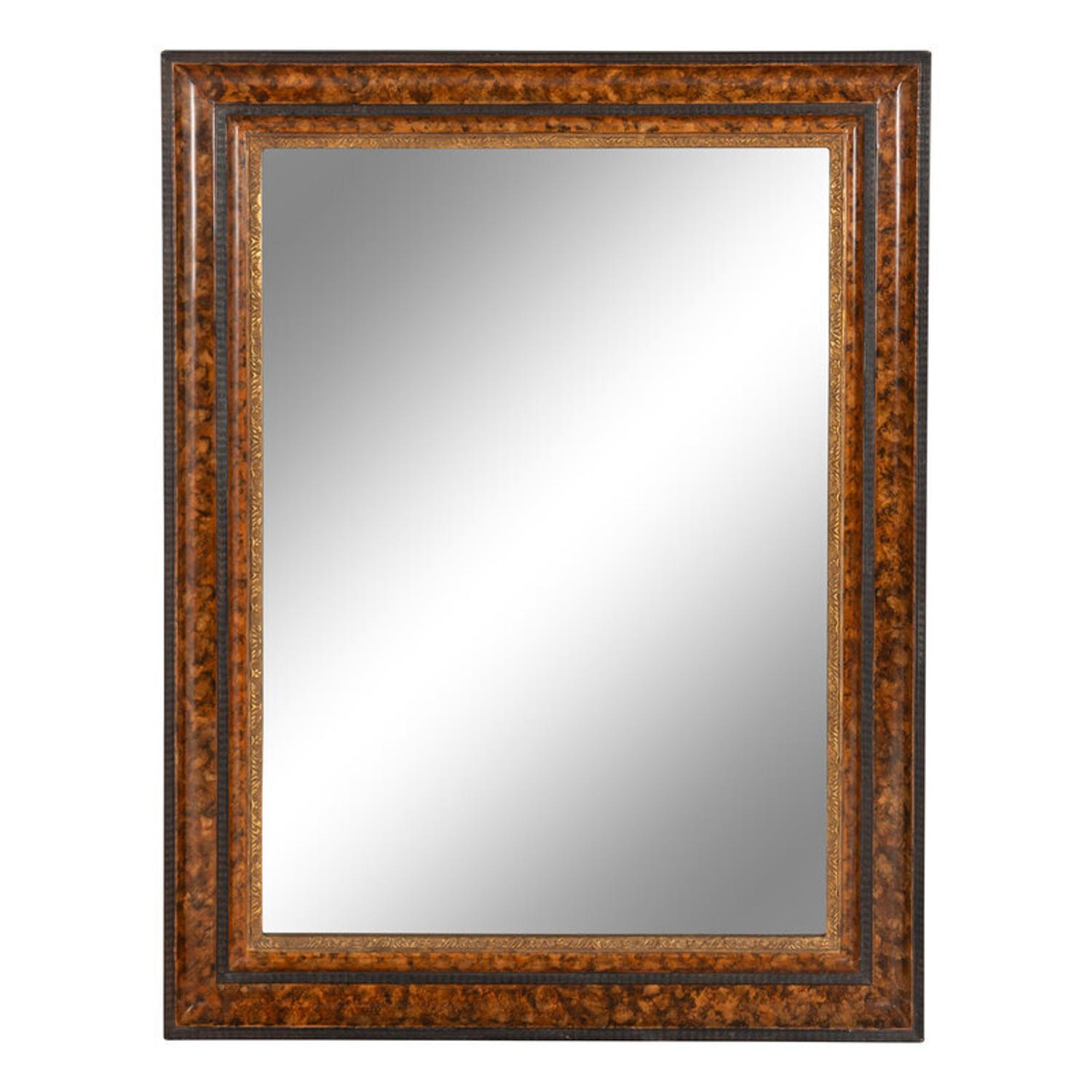 A Dutch Style Grain-Painted, Parcel Gilt and Ripple-Molded Mirror
