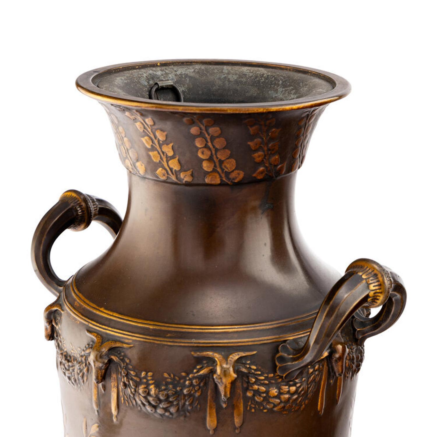 A Pair of Neoclassical Patinated and Parcel Gilt Bronze Vases