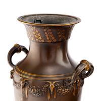 A Pair of Neoclassical Patinated and Parcel Gilt Bronze Vases