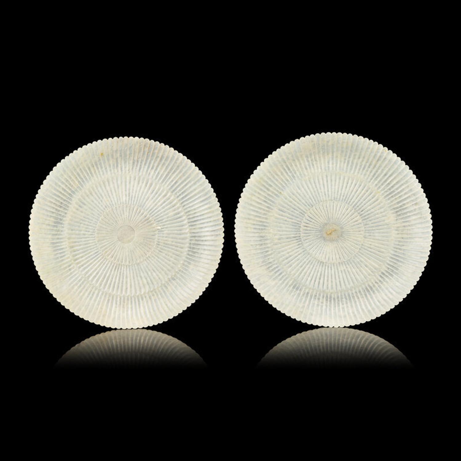 A Pair of Chinese White Jade 'Chrysanthemum' Dishes, Qing Dynasty to Republic Period 晚清-民國 白玉菊瓣盤一對