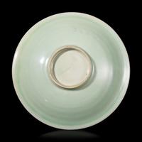 A Chinese Longquan Celadon Glazed Dish, 13th/14th Century 宋/元 龍泉窯梅子青釉碟