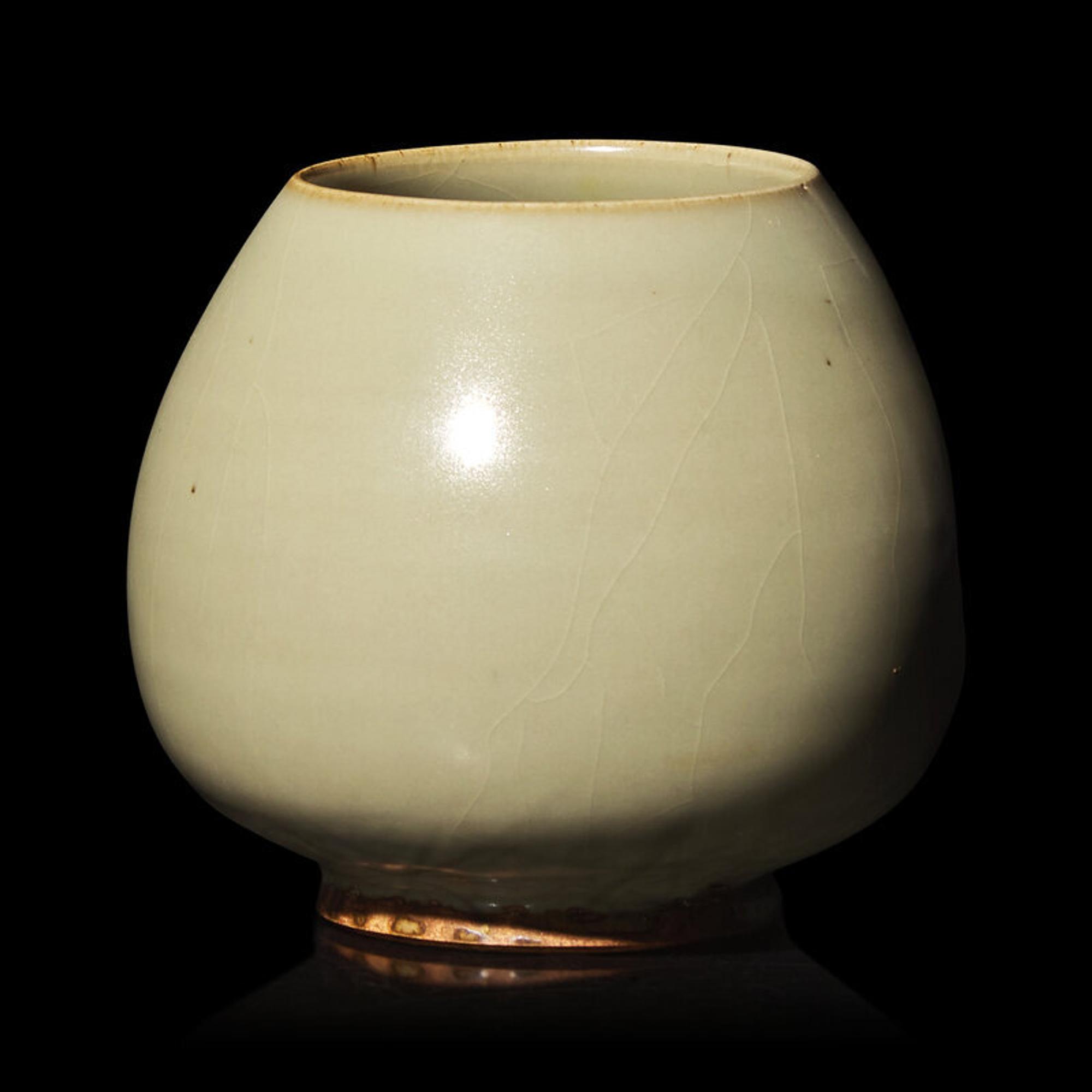 A Chinese Green-Glazed 'Lotus Bud' Vessel, Junyao or Ruzhou Donggou Kilns, Jin Dynasty 金 鈞窯或汝洲東溝窰綠釉鷄心罐