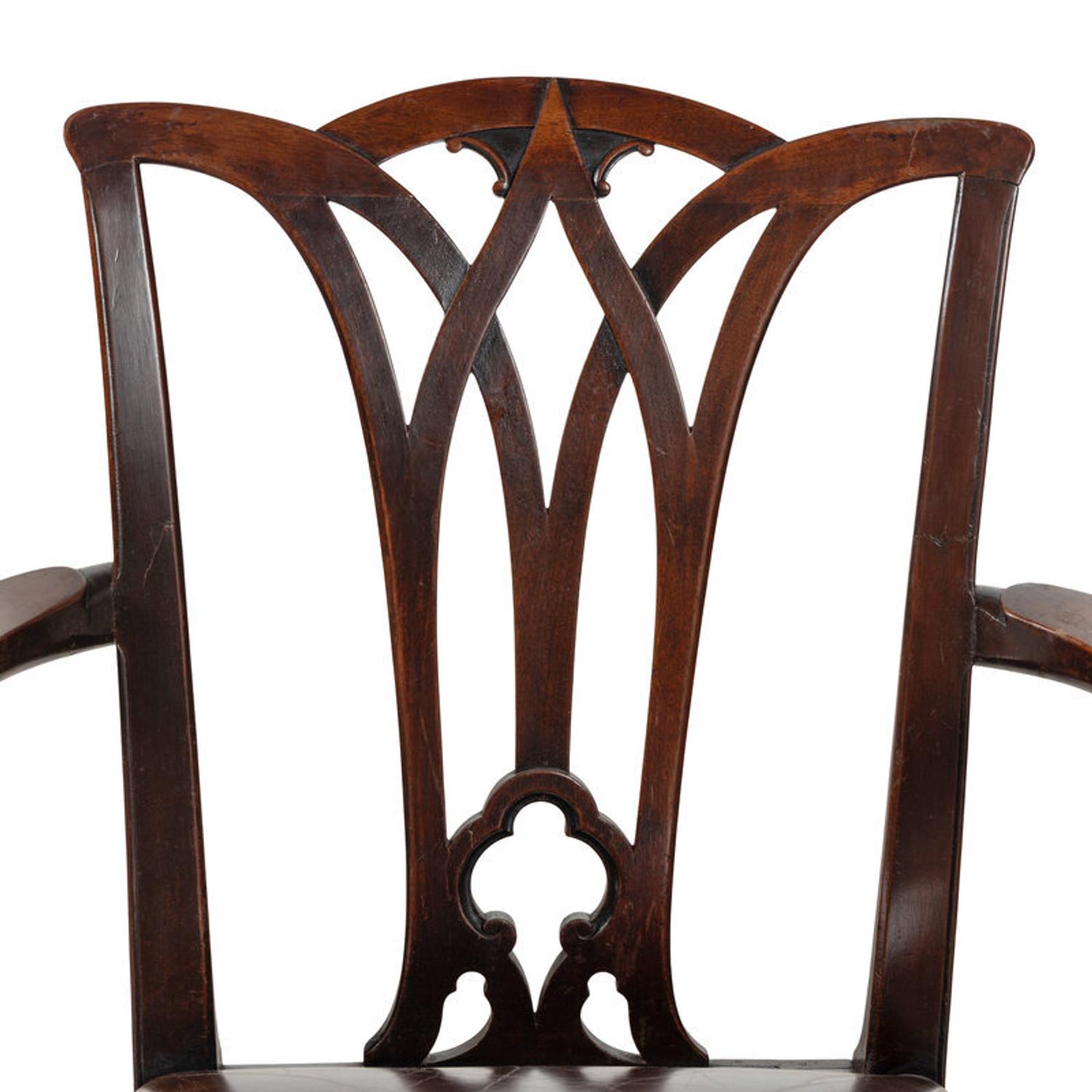 A Set of Fourteen English Mahogany Dining Chairs