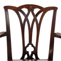A Set of Fourteen English Mahogany Dining Chairs