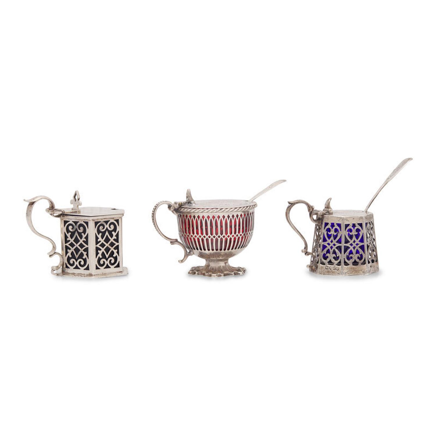 Three English Pierced Silver Mustard Pots and Two Silver Mustard Spoons