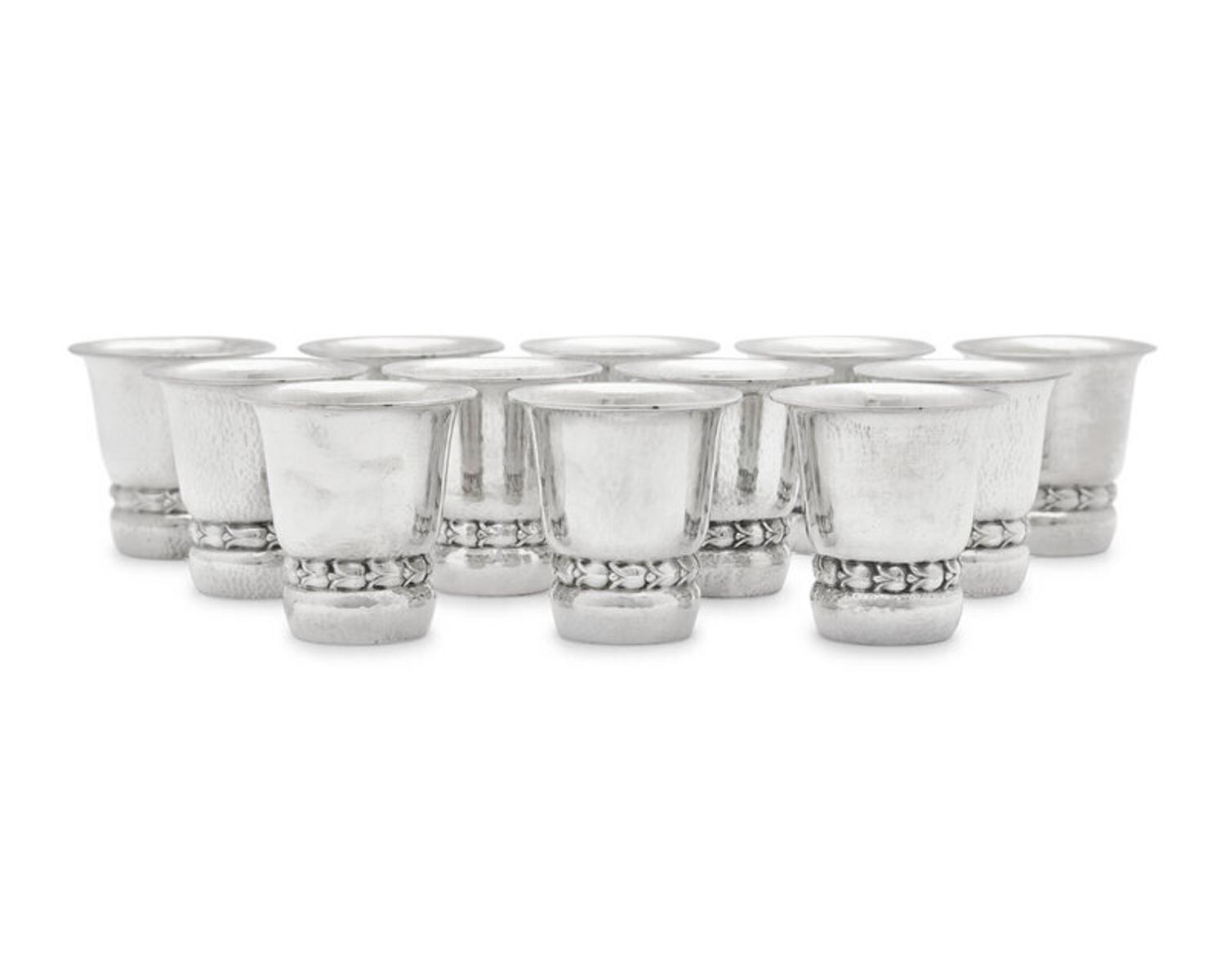 A Set of Twelve Georg Jensen Silver Beakers