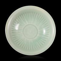 A Chinese Longquan Celadon Glazed Dish, 13th/14th Century 宋/元 龍泉窯梅子青釉碟