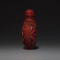 A Chinese Carved Cinnabar Lacquer Snuff Bottle, Late 18th-19th Century 清中期 剔紅松下高士圖鼻烟壺
