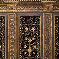 An Italian Iron-Mounted and Parcel Gilt Bookcase Supplied by Addison Mizner for the Everglades Club, Palm Beach