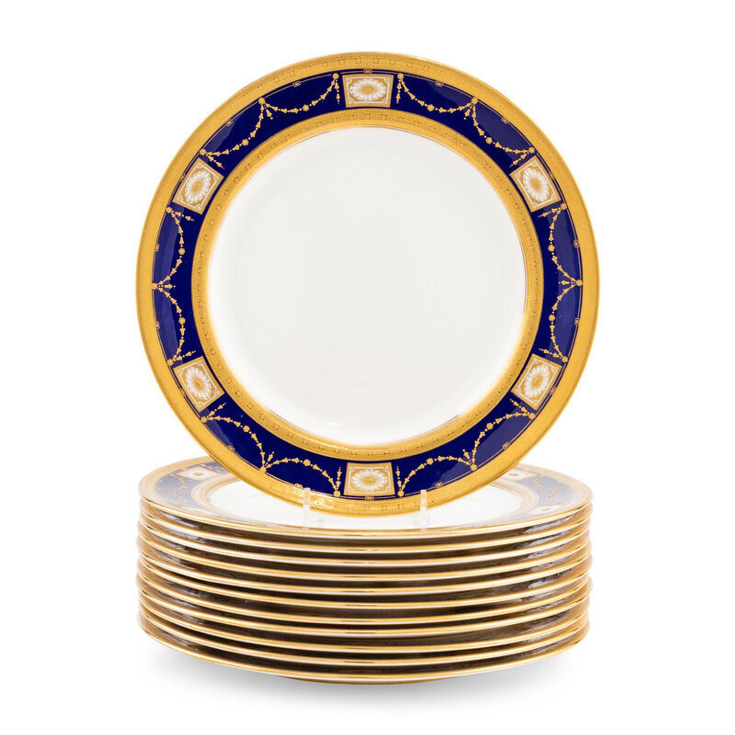A Set of Twelve Royal Doulton Parcel Gilt Porcelain Dinner Plates