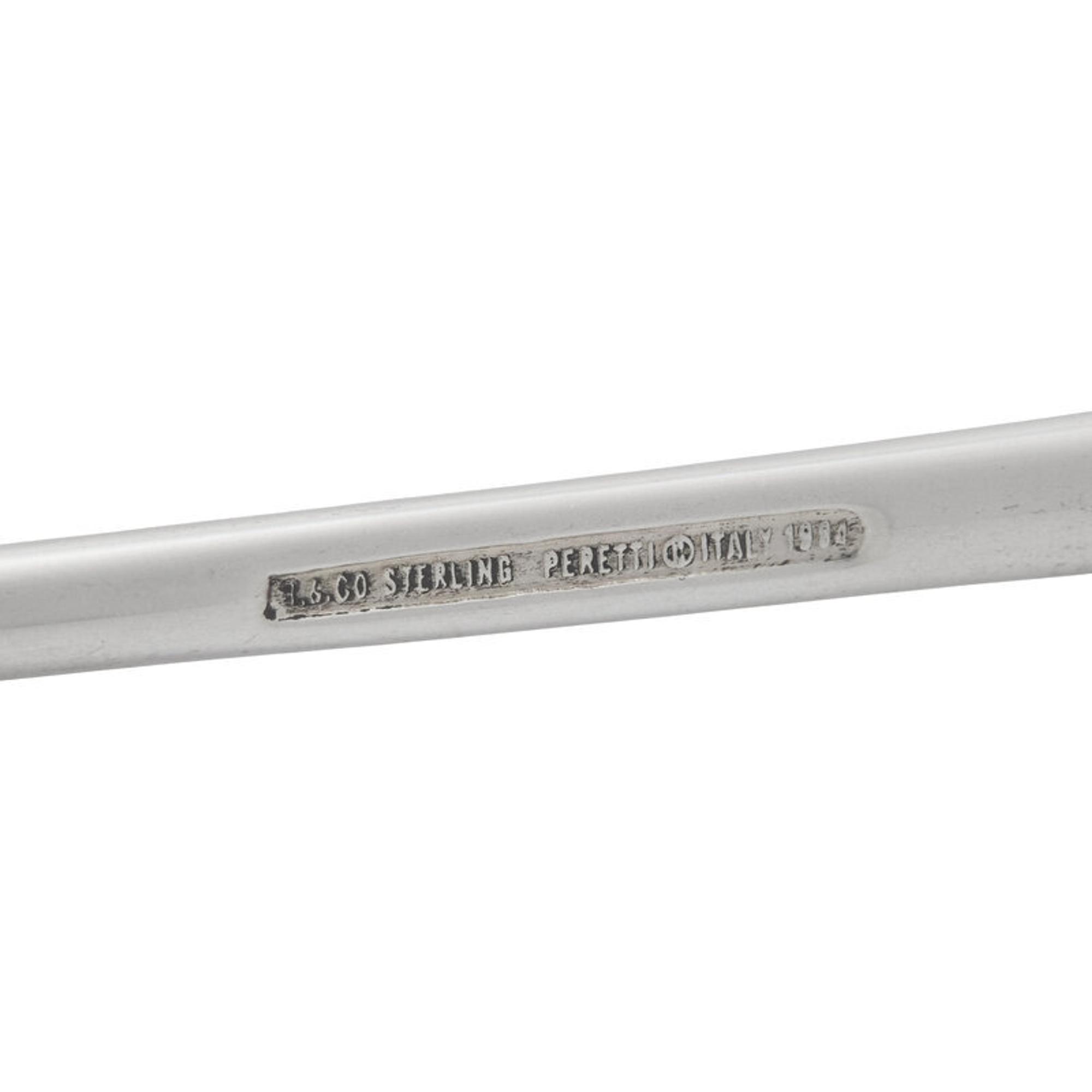 A Tiffany and Co. Silver Candle Snuffer