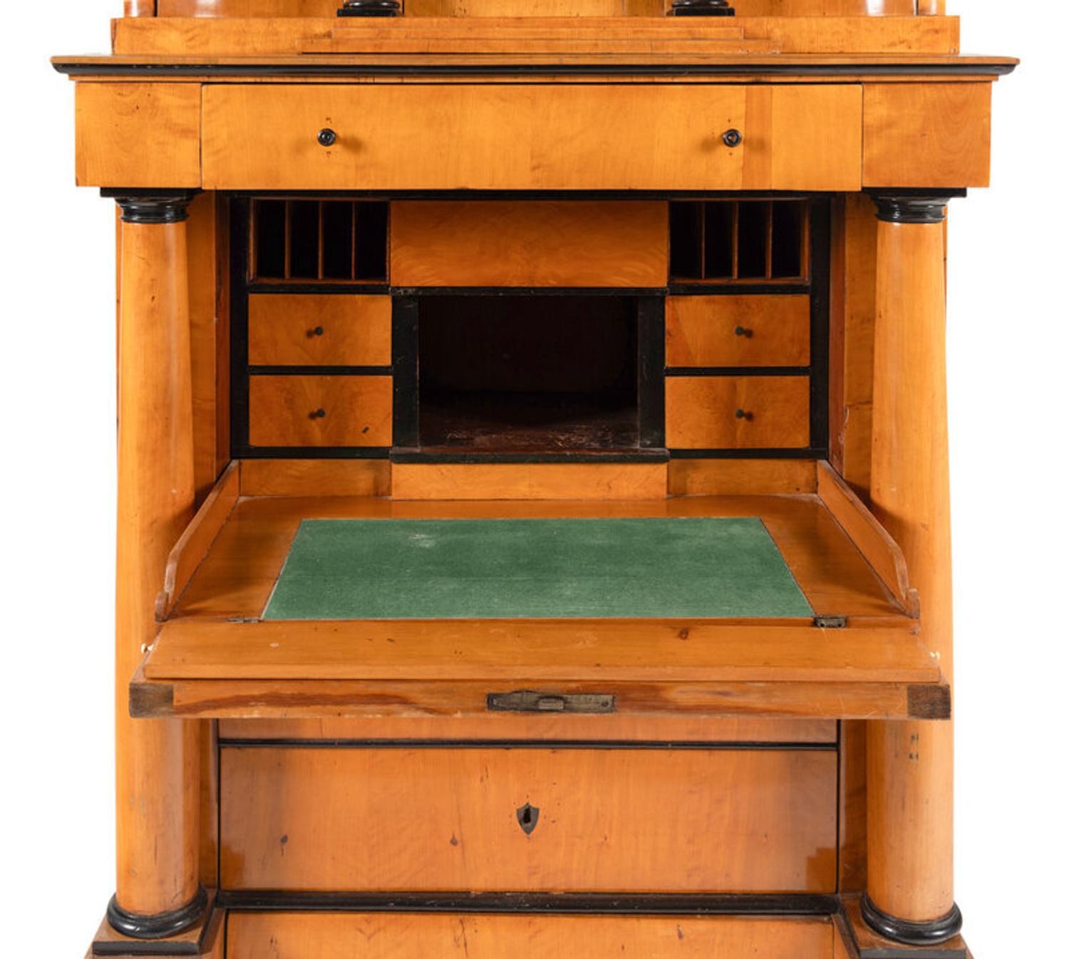 A Biedermeier Part-Ebonized Birch Bureau Cabinet