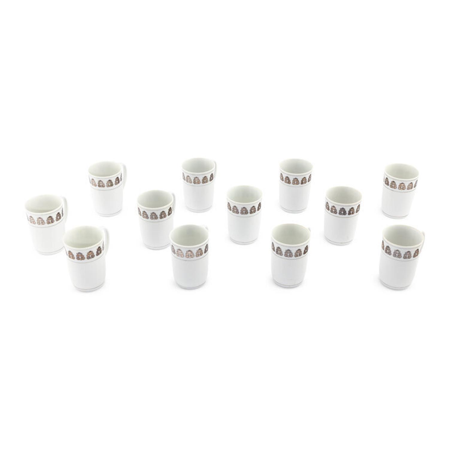 A Set of Twelve Georg Jensen Acorn Porcelain Coffee Mugs