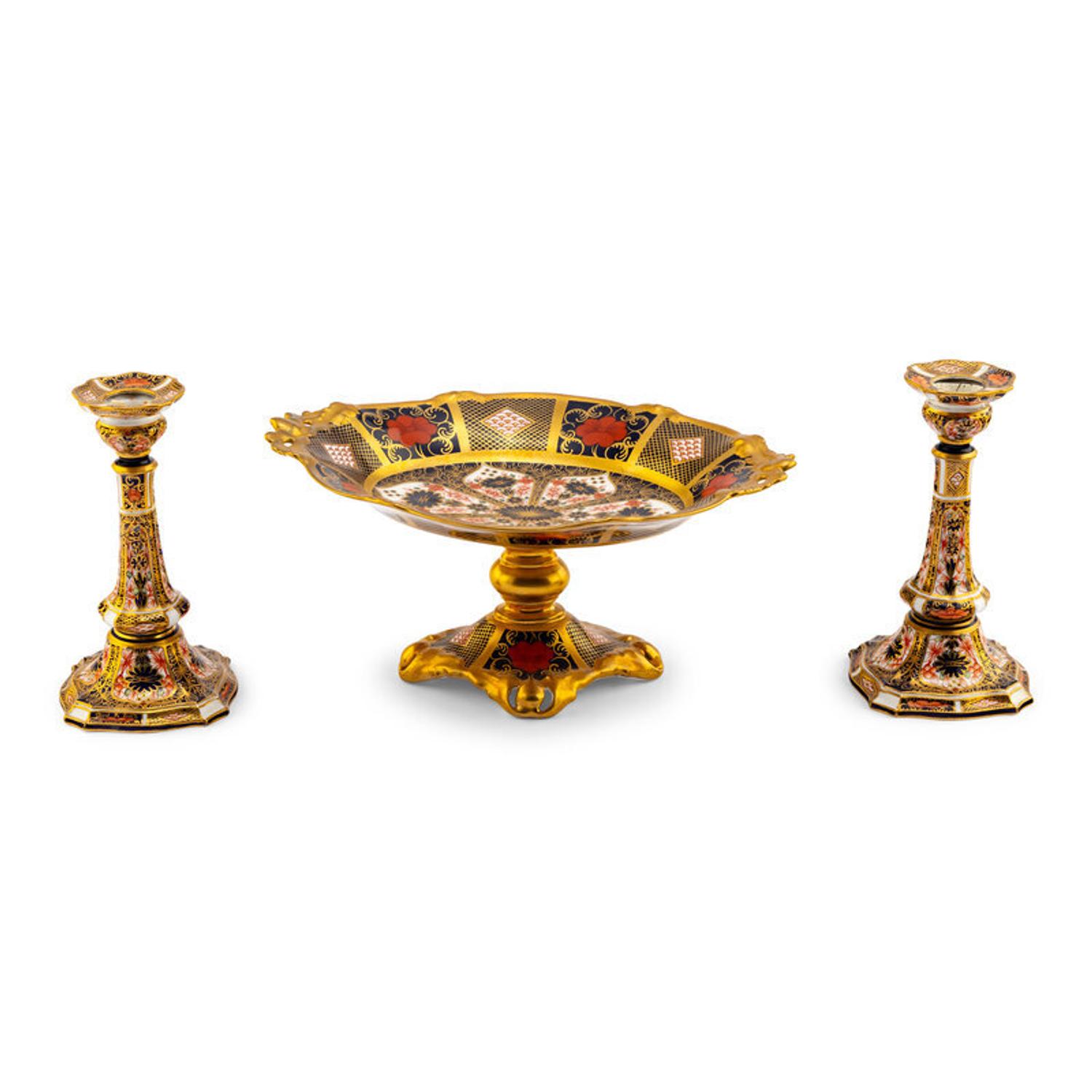 A Pair of Royal Crown Derby Imari Porcelain Candlesticks and a Tazza