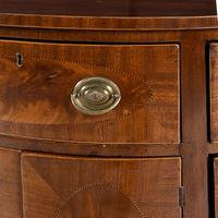 A George III Mahogany Demilune Cabinet