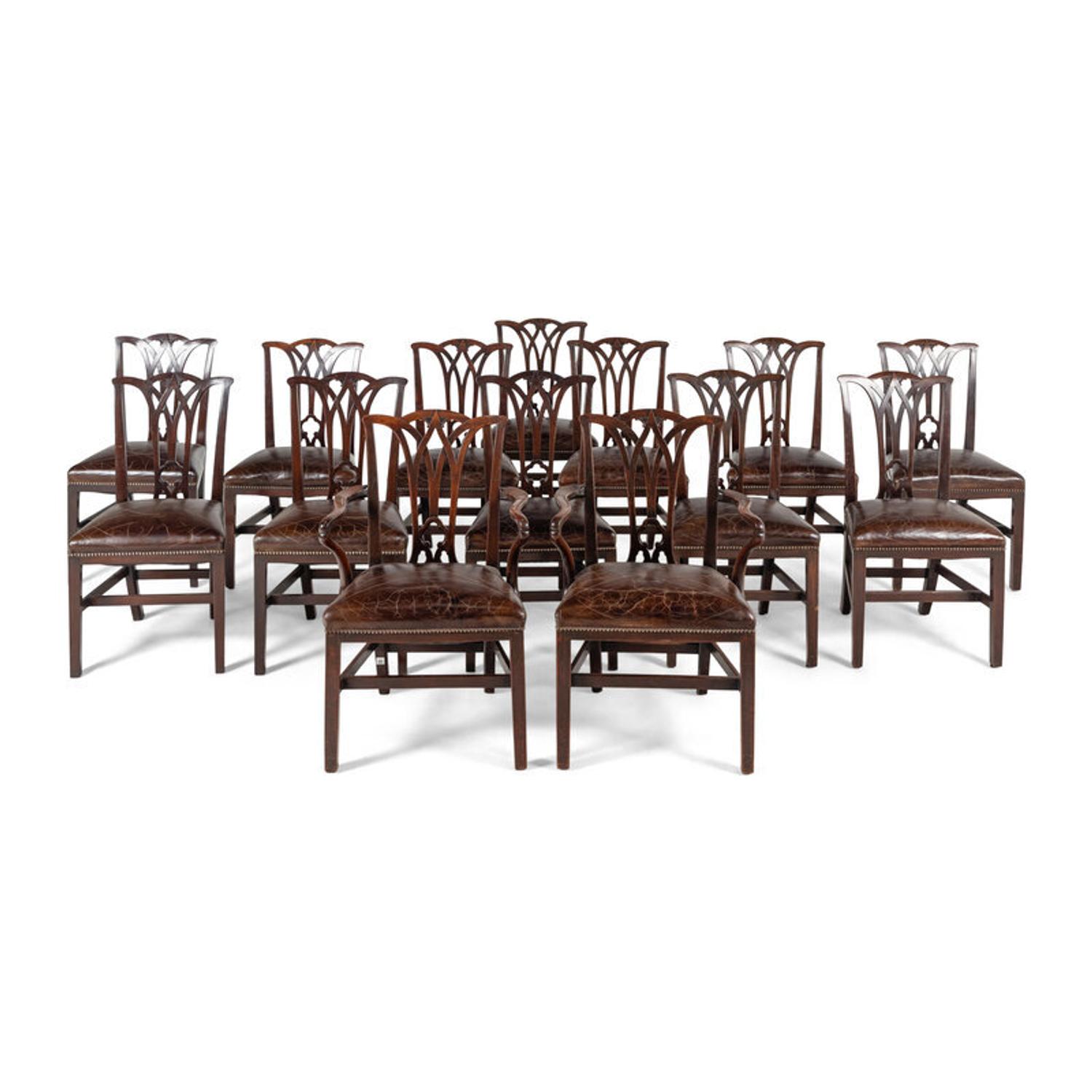 A Set of Fourteen English Mahogany Dining Chairs