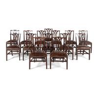 A Set of Fourteen English Mahogany Dining Chairs