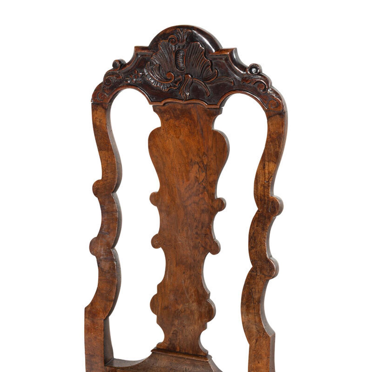 A Set of Three Dutch Carved Walnut Side Chairs