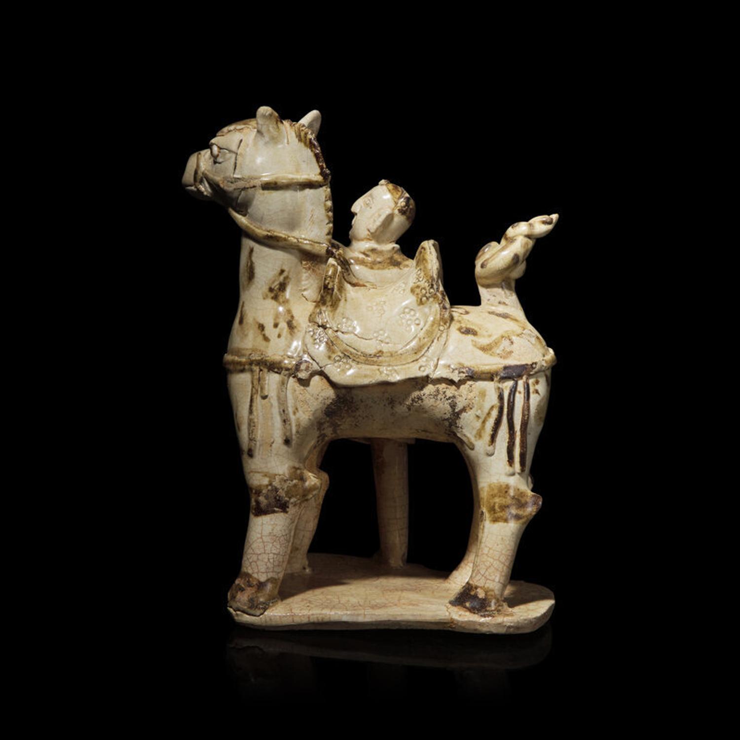 A Chinese Qingbai Iron-Brown Splashed Equestrian Figural Group, Northern Song Dynasty 北宋 湖田點褐彩胡人牽馬俑