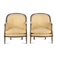 A Pair of Louis XVI Painted and Parcel Gilt Bergères