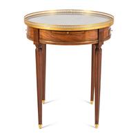 A Louis XVI Style Gilt Bronze Mounted Mahogany Bouillotte Table